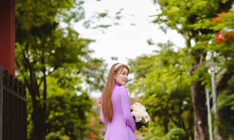 Á hậu Trần Thụy Thanh Nhã diện áo dài tím khám phá cảnh quan xứ Huế